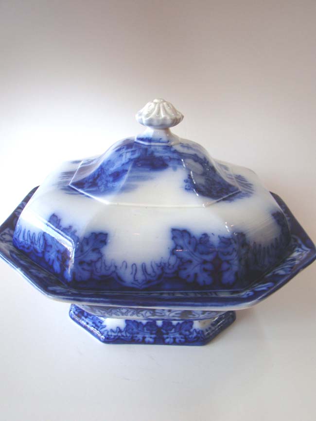 A beautiful 'Flow Blue' stoneware octagonal covered tureen marked KAOLIN Ware, Rhine pattern circa 1850